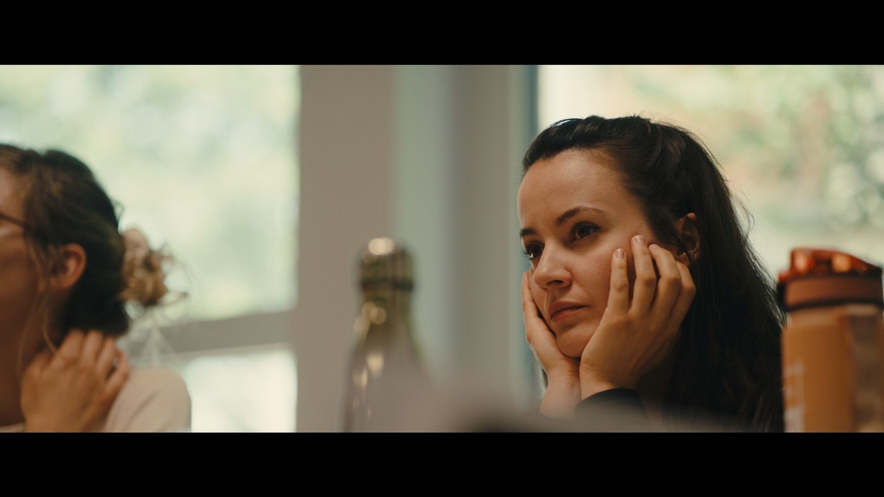 Actress performing in front of the group during a scene exercise.